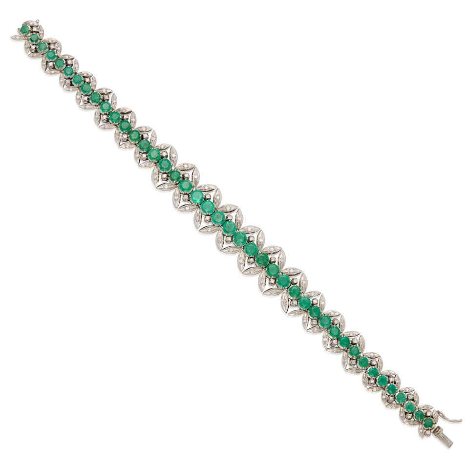 14K WHITE GOLD, EMERALD, AND DIAMOND BRACELET: 14K WHITE GOLD, EMERALD, AND DIAMOND BRACELET • Numerous round shaped emeralds measuring approximately 2.90mm to 4.30mm in diameter • Numerous round shaped diamonds weighing approximately