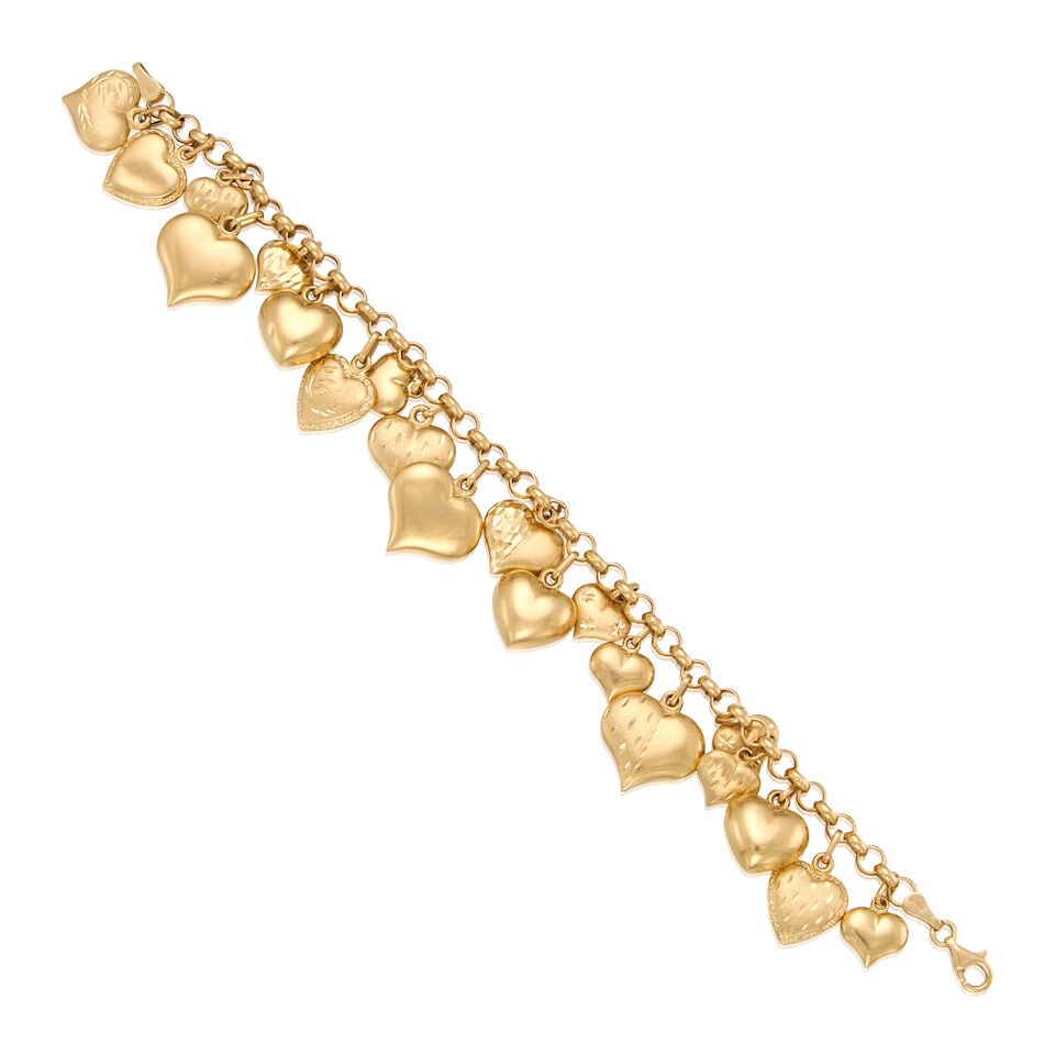 14K YELLOW GOLD HEART CHARM BRACELET: 14K YELLOW GOLD HEART CHARM BRACELET • Twenty heart charms measuring approximately 8.00mm x 9.90mm to 13.65mm x 15.95mm • Length 6 3/4 in. • Estimated gross weight: 14.9