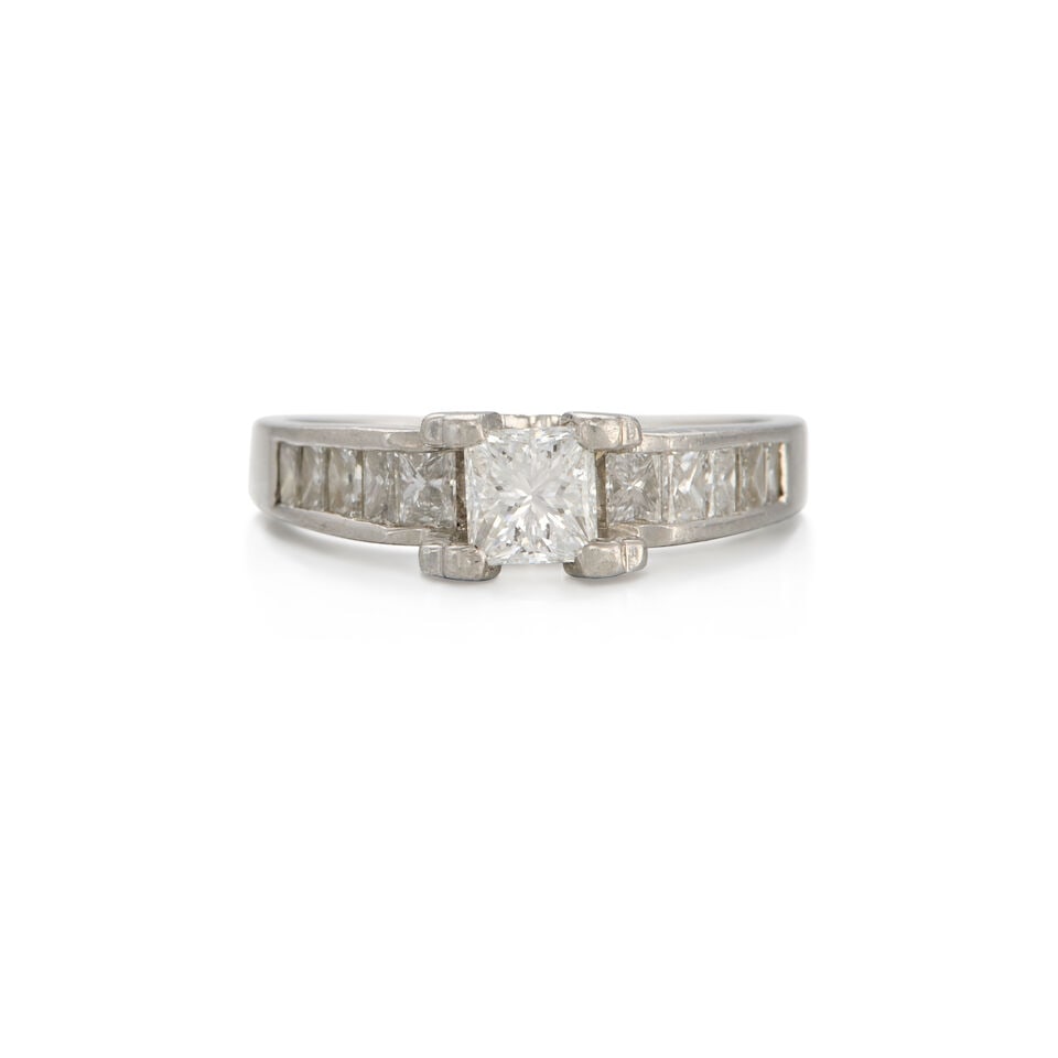 PLATINUM AND DIAMOND RING: PLATINUM AND DIAMOND RING • A square shaped diamond weighing approximately 0.45 carat • Ten rectangular shaped diamonds weighing approximately 0.30 carat total • Size 5 1/2 •