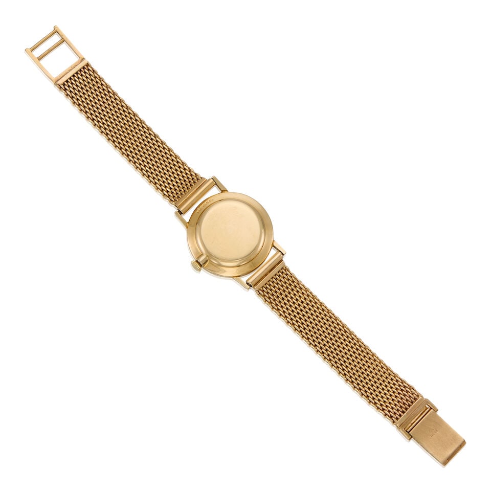 MOVADO: A 14K YELLOW GOLD BRACELET WATCH - 2
