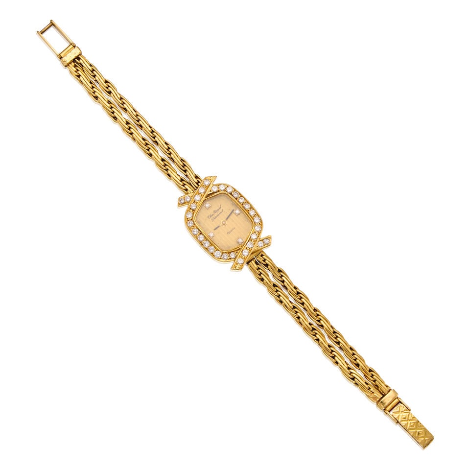 THE ROYAL DIAMOND: 18K YELLOW GOLD AND DIAMOND WRISTWATCH: THE ROYAL DIAMOND: 18K YELLOW GOLD AND DIAMOND WRISTWATCH • 18K yellow gold watch case and bracelet • Thirty-two round brilliant cut diamonds weighing approximately 0.60 carat