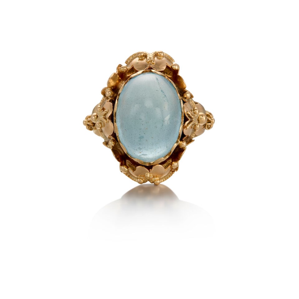 16K GOLD AND AQUAMARINE RING: 16K GOLD AND AQUAMARINE RING • One oval cabochon-shaped aquamarine weighing approximately 7.70 carats • Maker's mark present • Size 8 • Estimated gross weight: 7.0