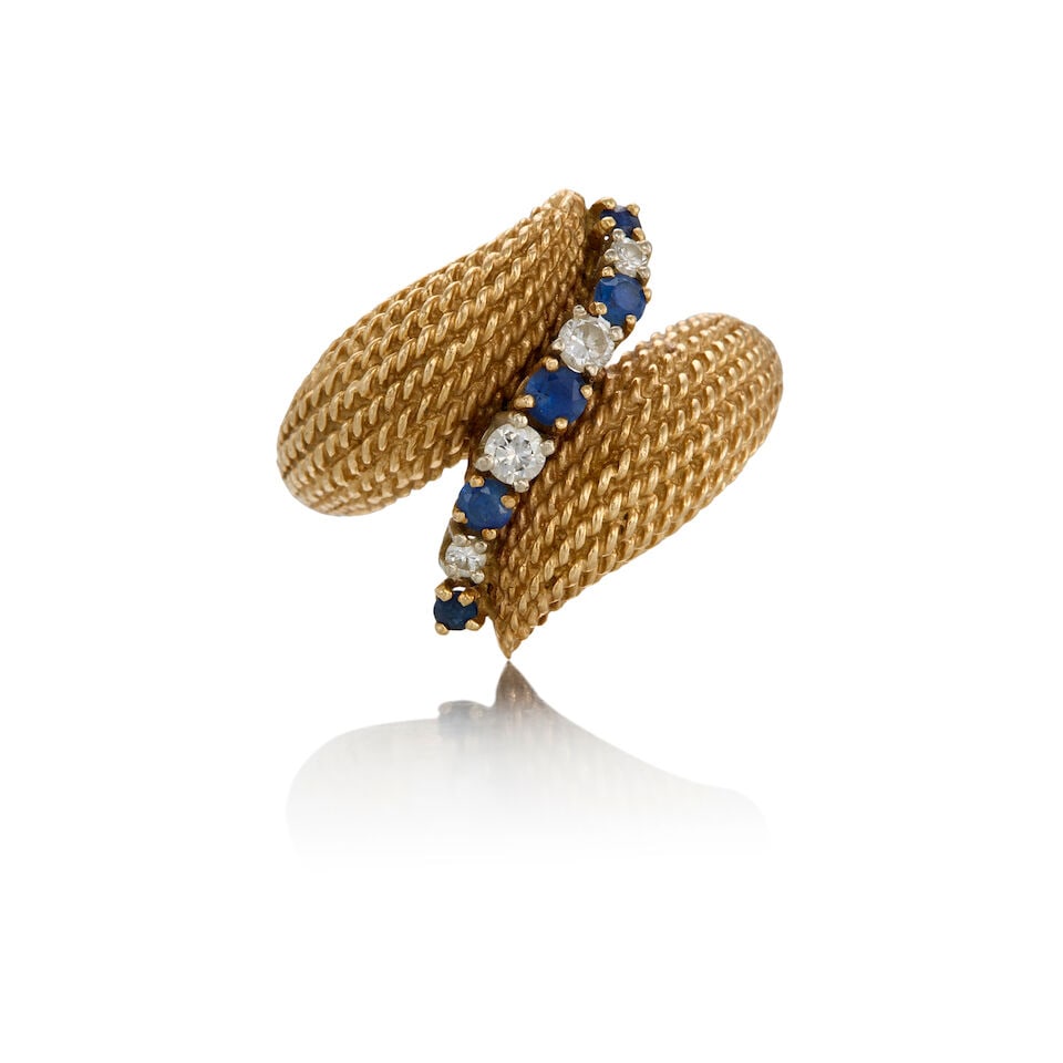 14K GOLD, SAPPHIRE AND DIAMOND RING: 14K GOLD, SAPPHIRE AND DIAMOND RING • Five round-shaped sapphires weighing approximately 0.29 carat total • Four round shaped diamonds weighing approximately 0.23 carat total •