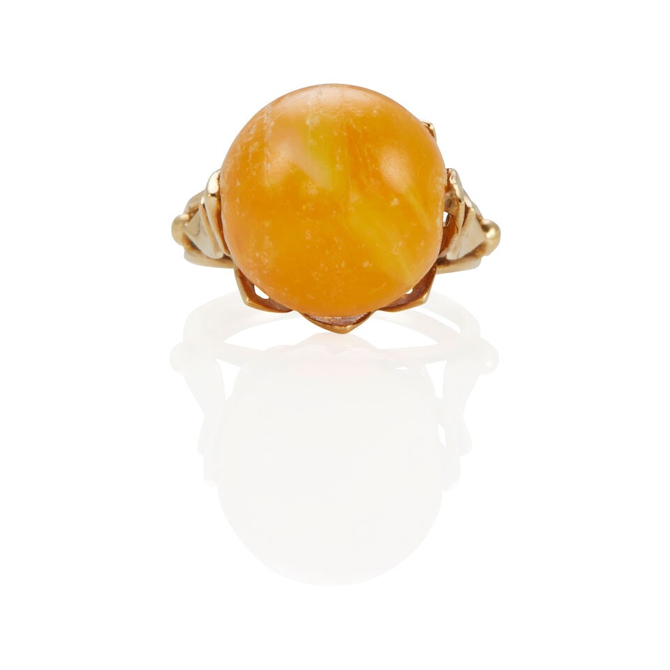 18K YELLOW GOLD AND AMBER RING: 18K YELLOW GOLD AND AMBER RING • One drilled amber bead measuring approximately 14.60mm in diameter • With maker's mark • Size 6 • Estimated gross weight: 7.6