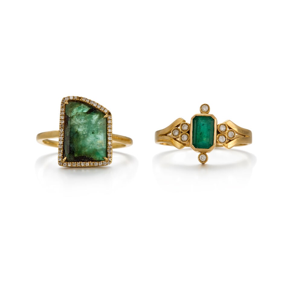 TWO GOLD, EMERALD, AND DIAMOND RINGS: TWO GOLD, EMERALD, AND DIAMOND RINGS • A 17K yellow gold ring with a rectangular shaped emerald weighing approximately 0.50 carat, with eight round shaped diamonds weighing approximately 0.08 ca