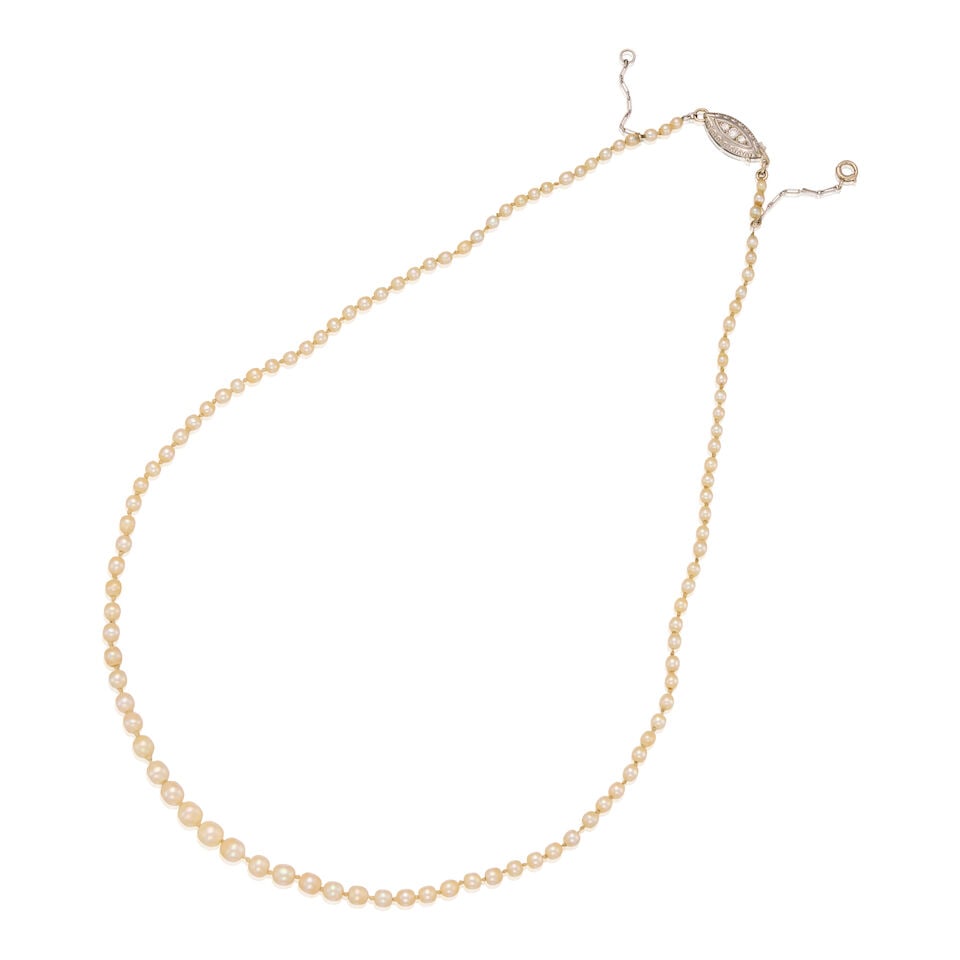 13K WHITE GOLD AND NATURAL PEARL NECKLACE WITH GIA REPORT: 13K WHITE GOLD AND NATURAL PEARL NECKLACE WITH GIA REPORT • Numerous natural pearls measuring from 2.10mm to 4.71mm in diameter • Three round shaped diamonds on the clasp weighing