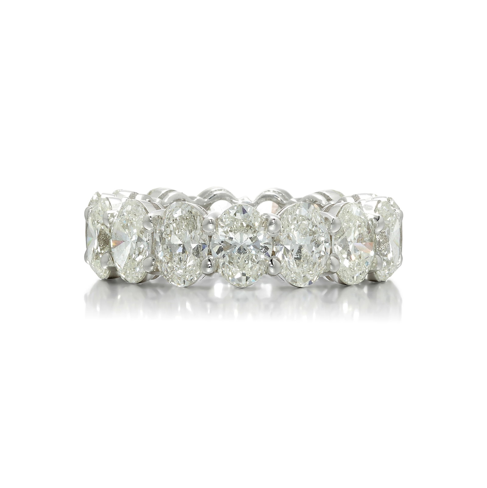 A DIAMOND RING: A DIAMOND RING An eternity band comprising oval-shaped diamonds weighing 7.50 carats total; mounted in 18k white gold; size 6 3/4 Footnotes: Accompanied by GIA Reports 6505671465, 3505915487,