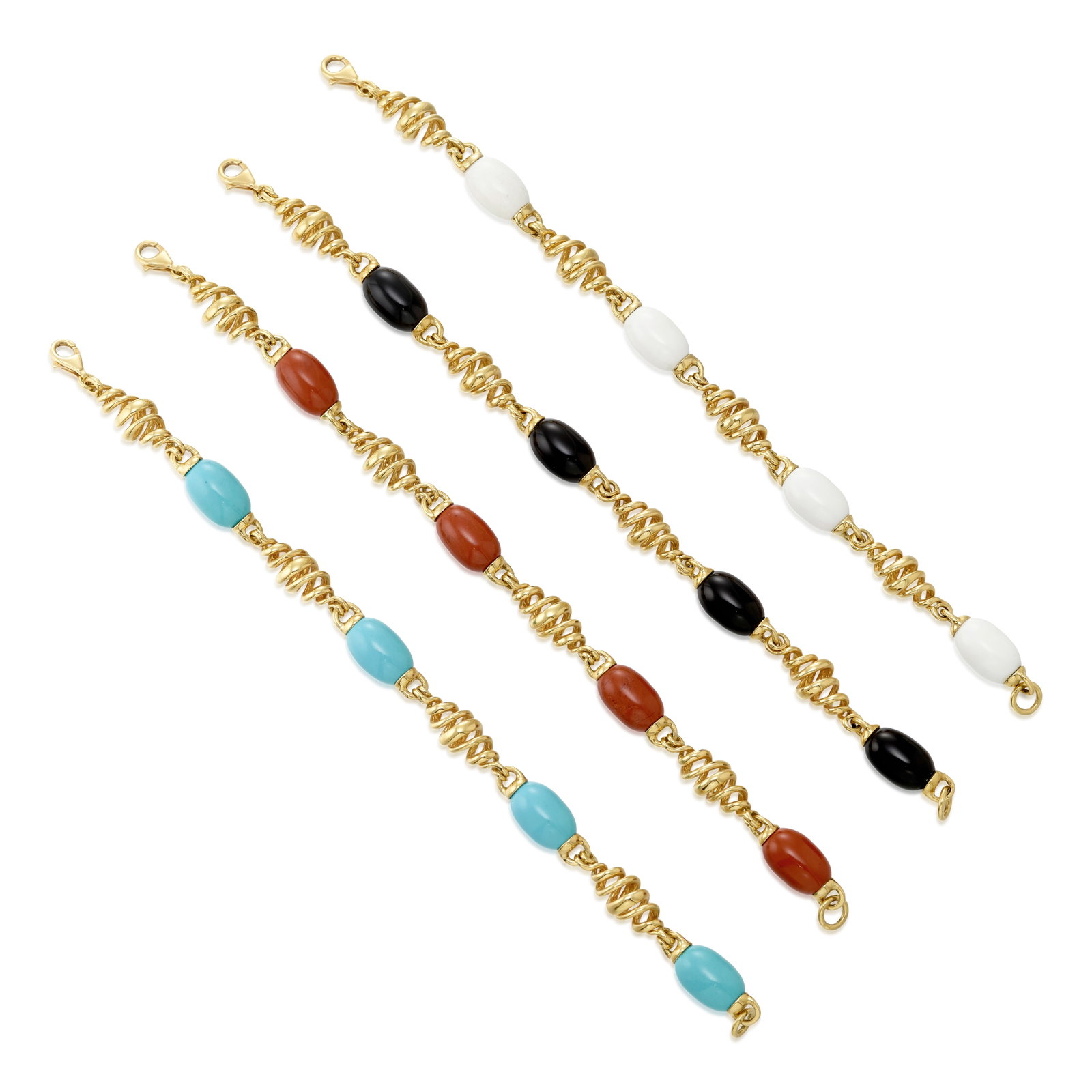 VAID ROMA: A SET OF 18K GOLD AND GEM-SET BRACELETS: VAID ROMA: A SET OF 18K GOLD AND GEM-SET BRACELETS Each alternating openwork, spiral links and oblong carved gemstones; each with Italian registered trademark; lengths 8 1/18 in. Footnotes: OVERALL CO