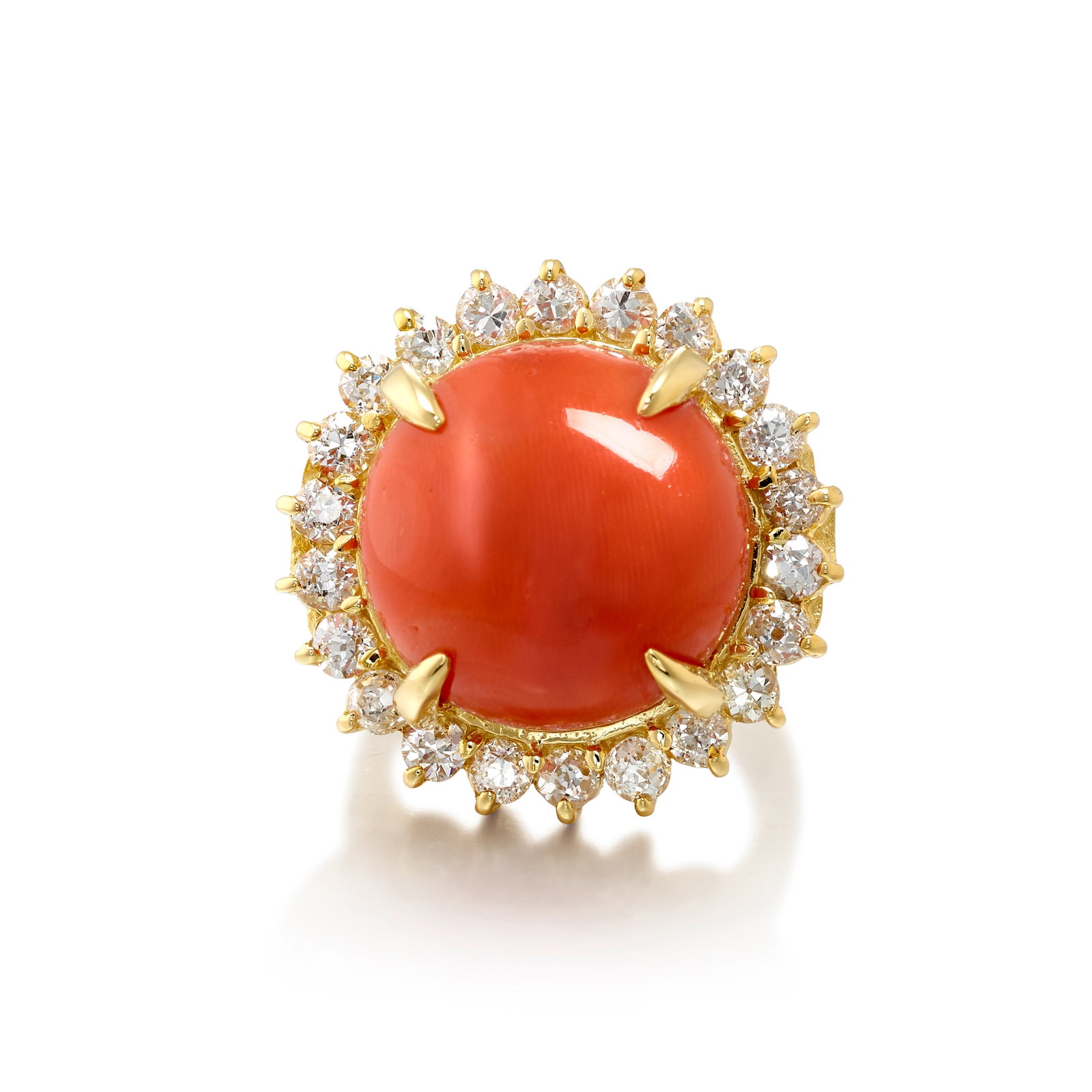 A 14K GOLD, CORAL AND DIAMOND RING: A 14K GOLD, CORAL AND DIAMOND RING Centering a round cabochon coral, in a surround of old European, old mine and transitional-cut diamonds; estimated total diamond weight 2.35 carats; size 7 Footnotes