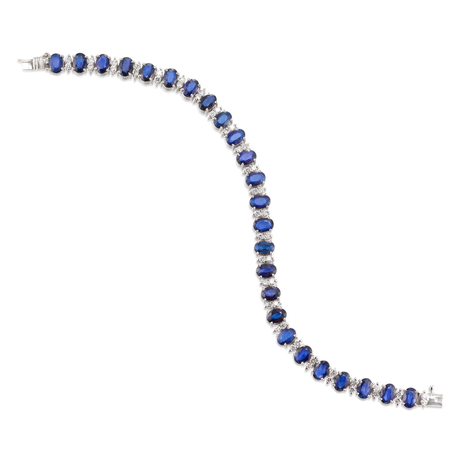 A 14K WHITE GOLD, SAPPHIRE AND DIAMOND BRACELET: A 14K WHITE GOLD, SAPPHIRE AND DIAMOND BRACELET A line bracelet alternating oval-shaped sapphires and pairs of round brilliant-cut diamonds; estimated total sapphire weight 15.10 carats; estimated tot