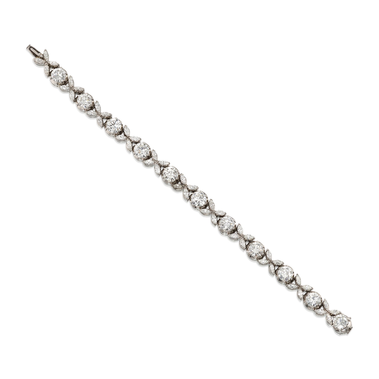 A DIAMOND BRACELET: A DIAMOND BRACELET A line bracelet alternating round brilliant-cut and marquise-shaped diamonds; estimated total diamond weight 11.65 carats; fabricated in platinum; length 6 3/4 in. Footnotes: OVERAL