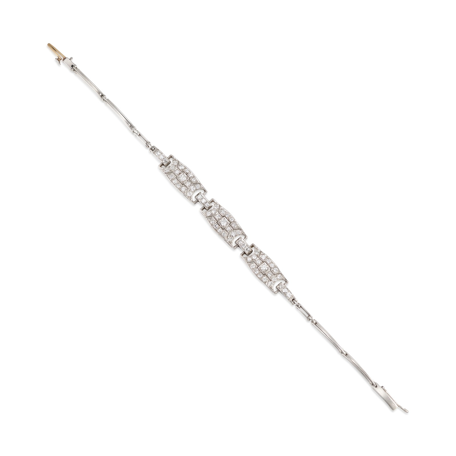 TIFFANY & CO.: A PLATINUM AND DIAMOND BRACELET, CIRCA 1925: TIFFANY & CO.: A PLATINUM AND DIAMOND BRACELET, CIRCA 1925 A link bracelet, centering a trio of geometric elements accented with old European, transitional and single-cut diamonds; signed Tiffany & Co