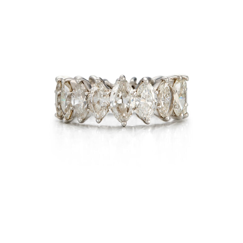 A DIAMOND BAND: A DIAMOND BAND • Platinum-topped white gold • Twenty marquise-shaped diamonds weighing approximately 2.30 carat total • Size 6 1/4 • Estimated gross weight: 8.10
