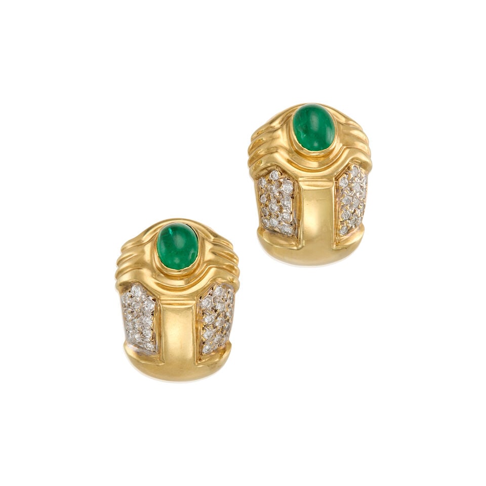 14K YELLOW GOLD, EMERALD AND DIAMOND EARCLIPS: 14K YELLOW GOLD, EMERALD AND DIAMOND EARCLIPS • Two oval cabochon emeralds measuring approximately 7.72mm x 5.73mm x depth cannot be determined due to the setting • Numerous round shaped