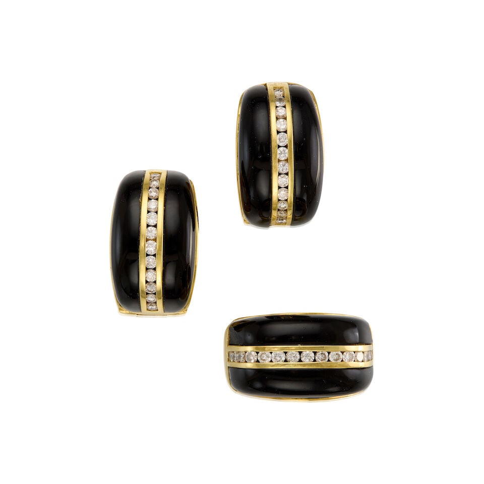 GOLD, ONYX, AND DIAMOND RING AND EARRING SET: GOLD, ONYX, AND DIAMOND RING AND EARRING SET • A 18K yellow gold ring with two carved onyx pieces measuring approximately 23.27mm x 6.55mm, with fifteen round brilliant cut diamonds weighing