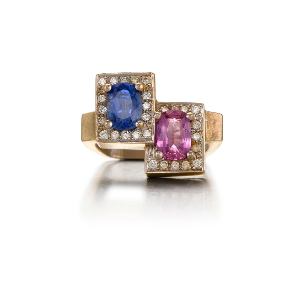 18K WHITE GOLD, SAPPHIRE, AND DIAMOND RING: 18K WHITE GOLD, SAPPHIRE, AND DIAMOND RING • Two oval shaped sapphires weighing approximately 1.80 carats total • Twenty-eight round shaped diamonds weighing approximately 0.25 carat