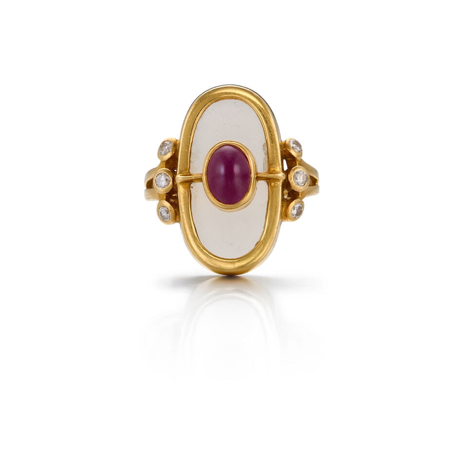 LALAOUNIS: 18K YELLOW GOLD, RUBY, ROCK CRYSTAL, AND DIAMOND RING: LALAOUNIS: 18K YELLOW GOLD, RUBY, ROCK CRYSTAL, AND DIAMOND RING • One cabochon ruby measuring approximately 6.73mm x 5.07mm x depth cannot be determined due to the setting • One oval