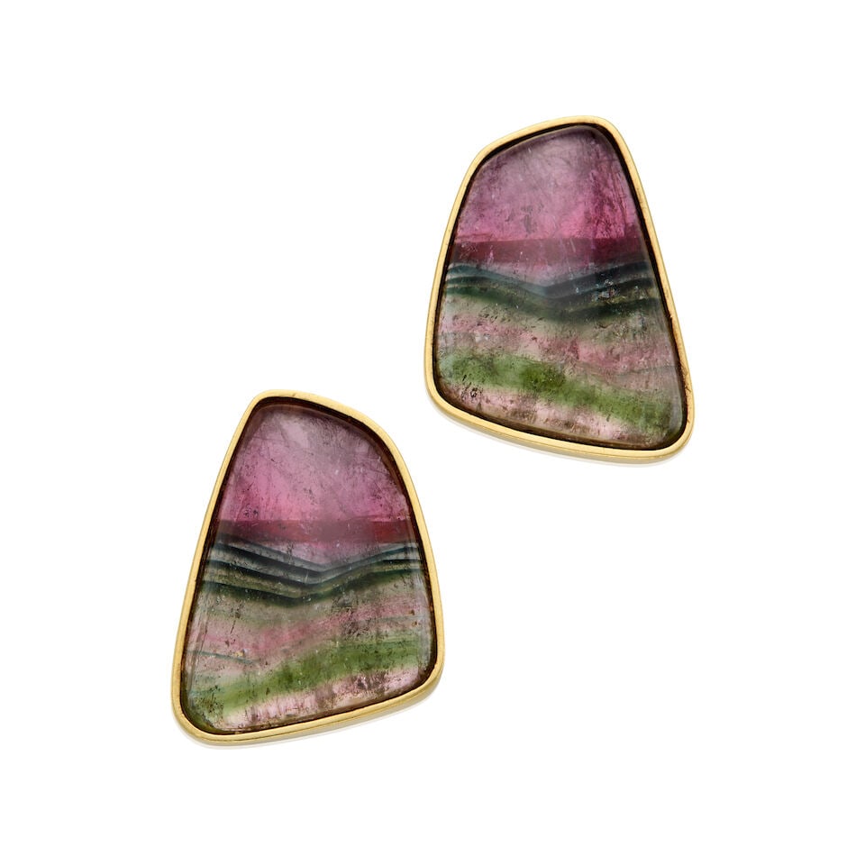 17K YELLOW GOLD AND TOURMALINE EARRINGS: 17K YELLOW GOLD AND TOURMALINE EARRINGS • Two cabochon tourmalines measuring approximately 31.13mm x 23.29mm x 5.93mm • Measures 1 1/4 in. x 1 in. • Estimated gross weight: 25.8 gram