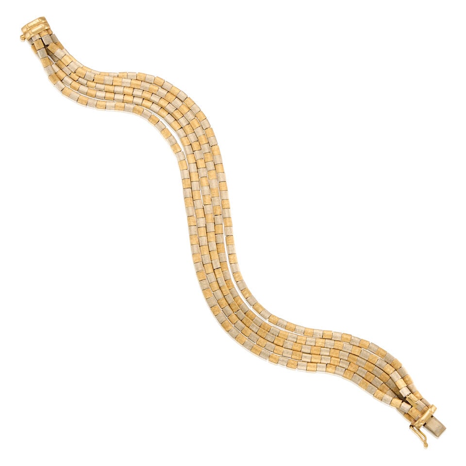 18K BICOLOR GOLD AND MULTISTRAND BRACELET: 18K BICOLOR GOLD AND MULTISTRAND BRACELET • Five strands of 18K white and yellow gold • Length 7 1/2 in. • Estimated gross weight: 34.1 grams Footnotes: OVERALL CONDITION: