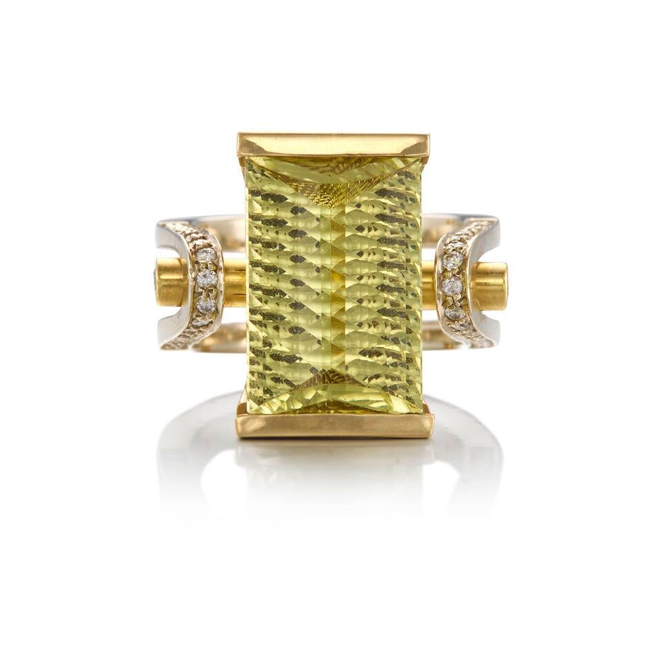 14K YELLOW GOLD, QUARTZ, AND DIAMOND RING: 14K YELLOW GOLD, QUARTZ, AND DIAMOND RING • A rectangular shaped fancy cut quartz measuring approximately 16.53mm x 11.43mm x depth cannot be determined due to the setting • Thirty-eight