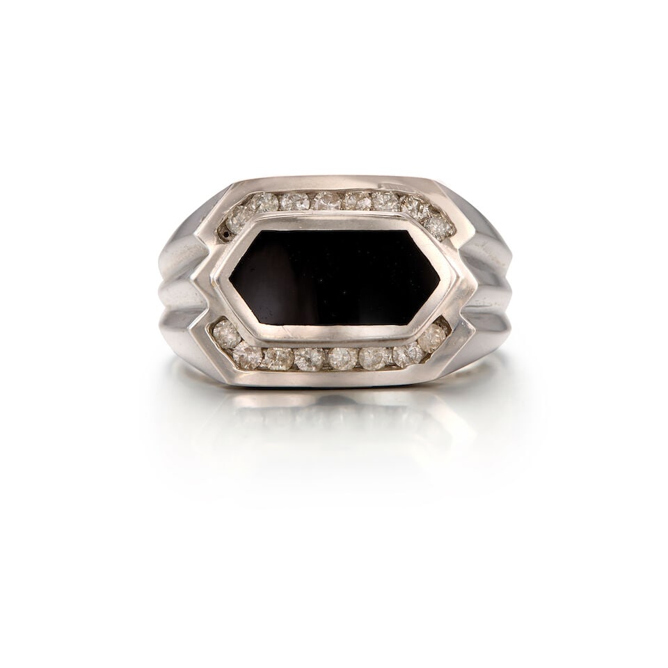 14K WHITE GOLD, ONYX AND DIAMOND RING: 14K WHITE GOLD, ONYX AND DIAMOND RING • One rectangular hexagonal-shaped onyx measuring approximately 13.66mm x 5.89mm x dept isn't available due to close back setting • Sixteen