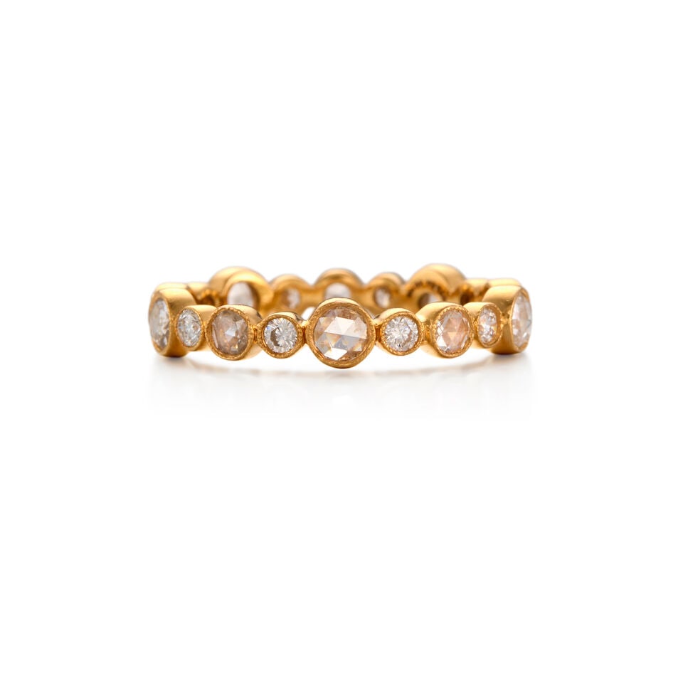 TIFFANY & CO.: 18K GOLD AND DIAMOND RING BAND: TIFFANY & CO.: 18K GOLD AND DIAMOND RING BAND • Ten rose-cut diamonds weighing approximately 0.50 carat total • Ten round-shaped diamonds weighing approximately 0.40 carat total • St