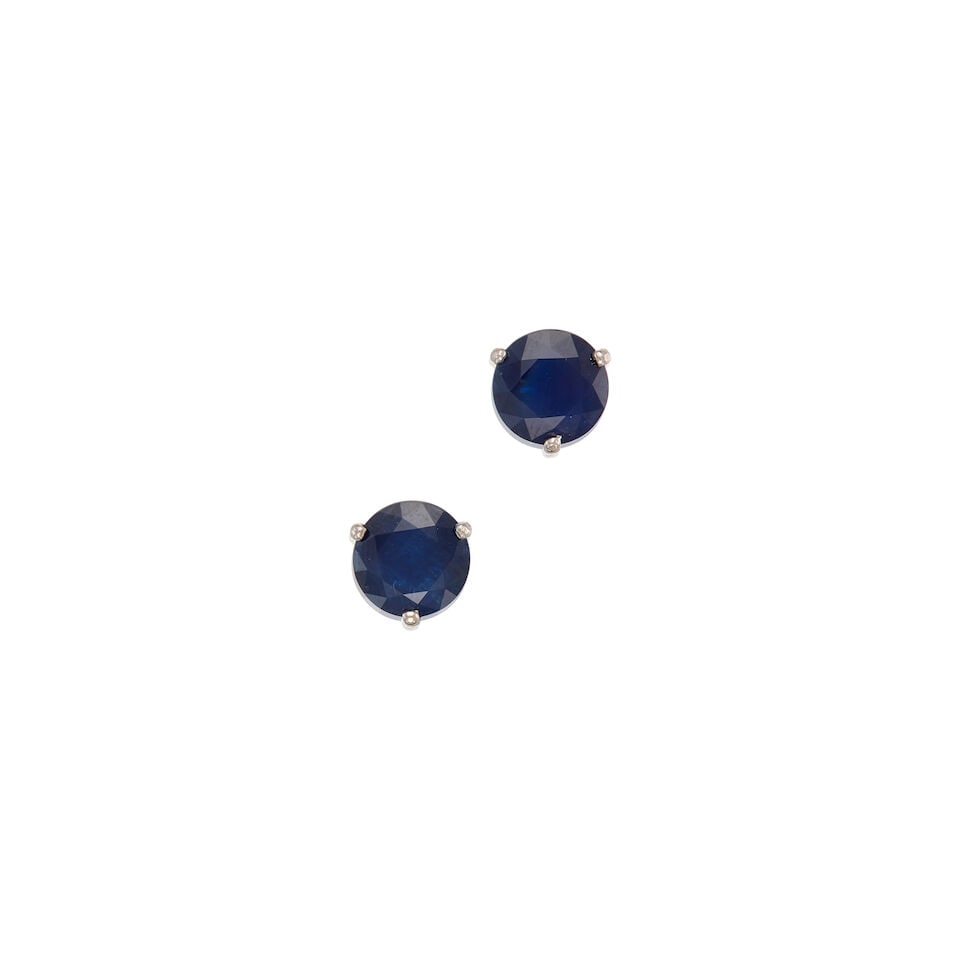 SAPPHIRE STUD EARRINGS: SAPPHIRE STUD EARRINGS • A pair of platinum earrings with mixed metal and rubber backings • Two round-shaped sapphires weighing approximately 3.28 carats total • Measures 5/8 in. x