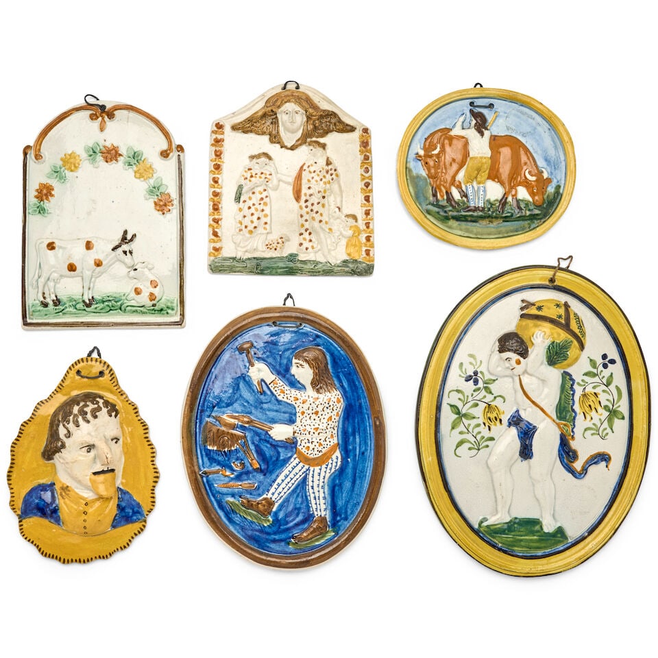 Six Pratt-type Wall Plaques, c. 1800,: Six Pratt-type Wall Plaques, c. 1800, all in relief, an oval self-framed with portrayal of Atlas bearing the world on his shoulders, lg. 8 1/2; an oval self-framed with an iron monger, lg. 7; an oval