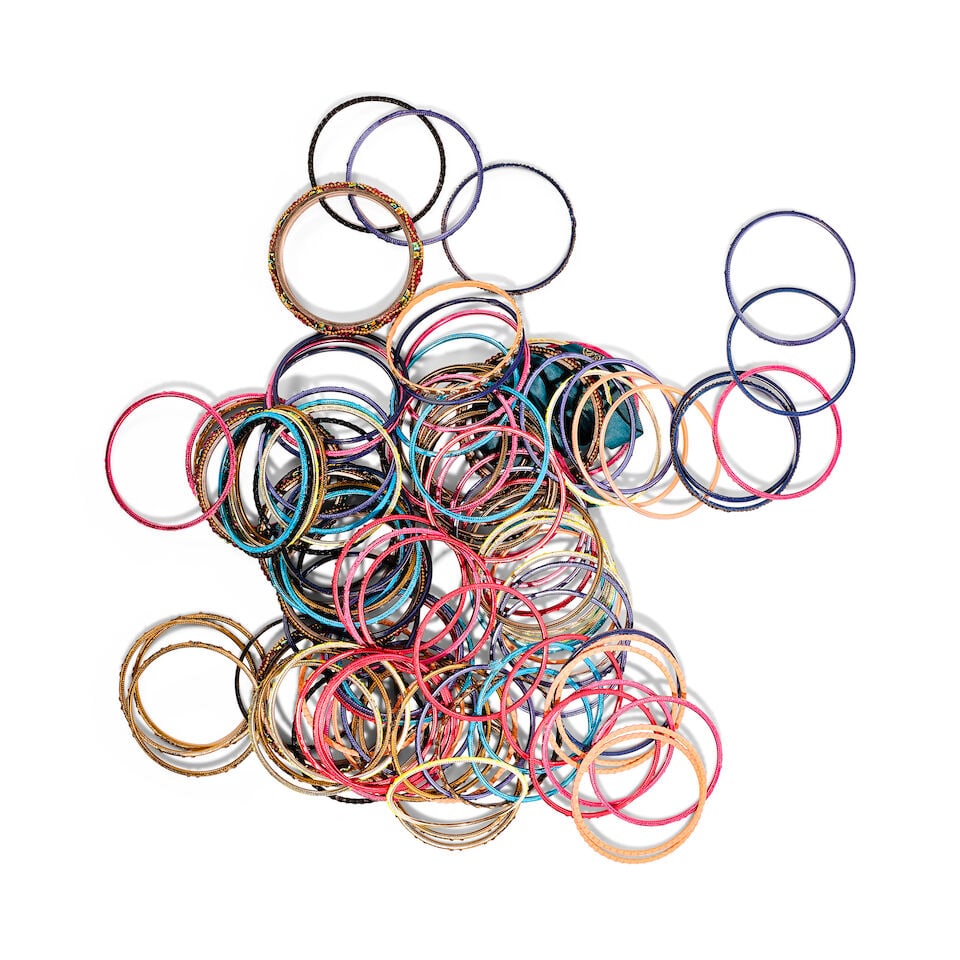 A LARGE GROUP OF STAGE-WORN GLITTER BRACELETS 1980s: A LARGE GROUP OF STAGE-WORN GLITTER BRACELETS 1980s Various colors, some with glitter and rhinestones. This lot is subject to the following lot symbols: ¤ ¤ Unless indicated by the ¤ sy