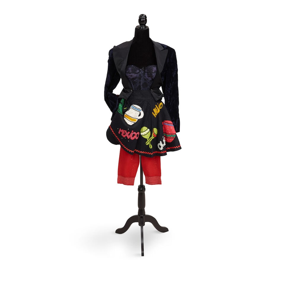 TWO STAGE-WORN LOOKS 1980s, styled by Cyndi Lauper: TWO STAGE-WORN LOOKS 1980s, styled by Cyndi Lauper First look: a Sandwich Isles brown paisley blazer, a Jantzen brown and yellow swimsuit, 12/34, a rusty brown bowtie, a navy paisley belt, and a