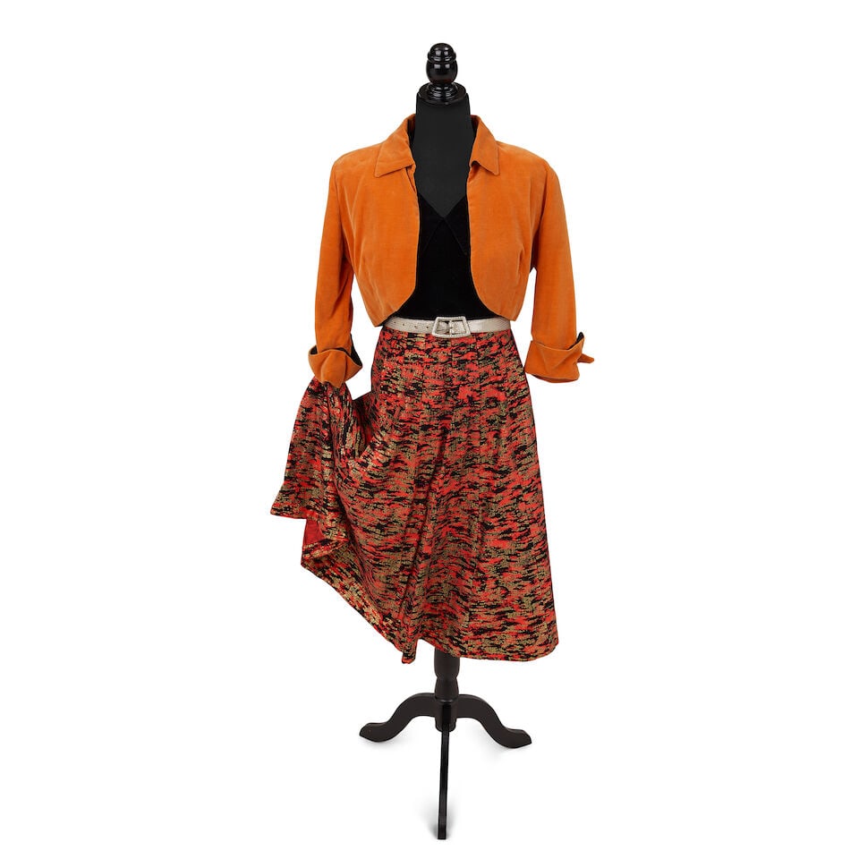 TWO LAYERED LOOKS 1980s, styled by Cyndi Lauper: TWO LAYERED LOOKS 1980s, styled by Cyndi Lauper First look: a State O' Maine mustard and black small check blazer, a Lady Marlene black lace strapless corset, 34B, a multicolored Venetian gondolier