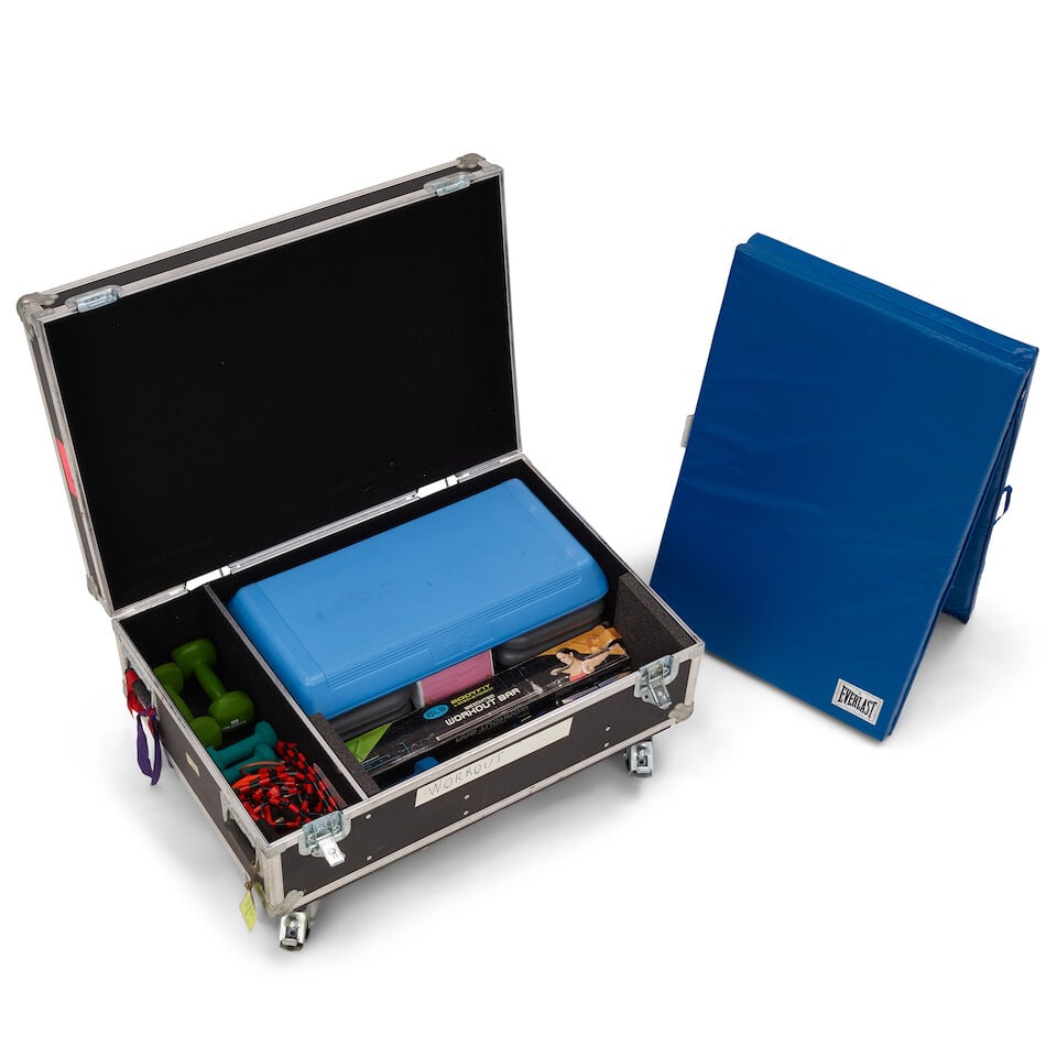 CYNDI LAUPER'S TOUR-USED EXERCISE EQUIPMENT IN A WHEELED ROAD CASE: CYNDI LAUPER'S TOUR-USED EXERCISE EQUIPMENT IN A WHEELED ROAD CASE Including (i) an Everlast blue mat; (ii) a The STEP blue step; (iii) a pair of Everlast pink pro style women's training gloves; (iv) 