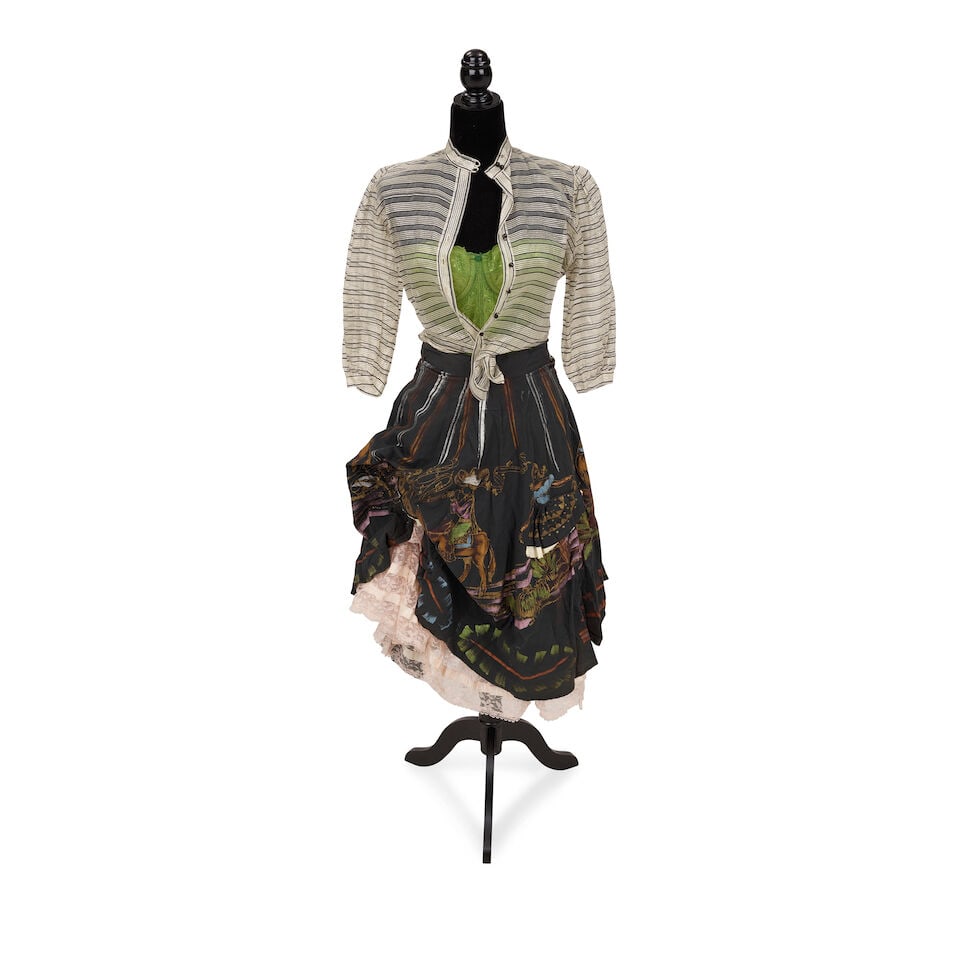 TWO VINTAGE LACY LOOKS 1980s-1990s, styled by Cyndi Lauper: TWO VINTAGE LACY LOOKS 1980s-1990s, styled by Cyndi Lauper First look: an Opera sheer white lurex trimmed blouse, 32, a green lace bustier, 34C, a black painted figural skirt, and a pink lace