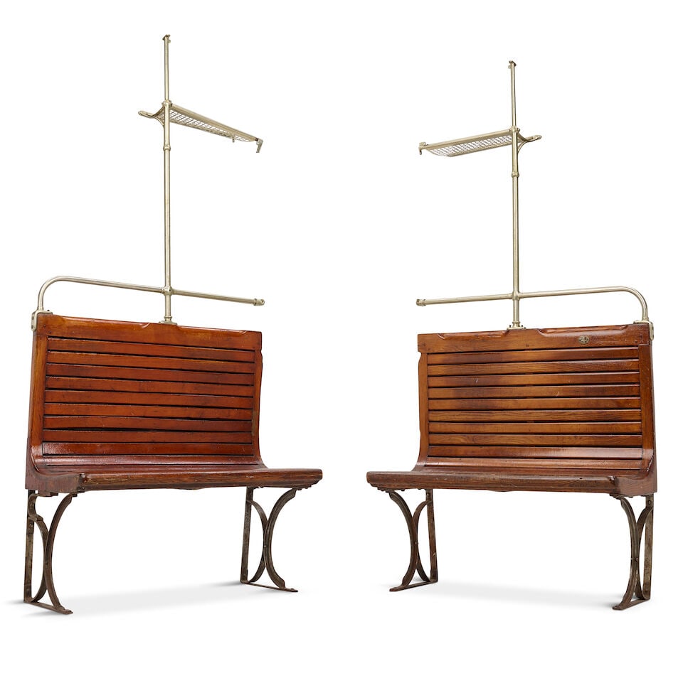 TWO VINTAGE METAL AND WOOD SUBWAY BENCHES: TWO VINTAGE METAL AND WOOD SUBWAY BENCHES With brass suitcase racks. 86 x 38 x 17 1/4in This lot is subject to the following lot symbols: W ¤ W Lot is oversized or otherwise such that it must be 