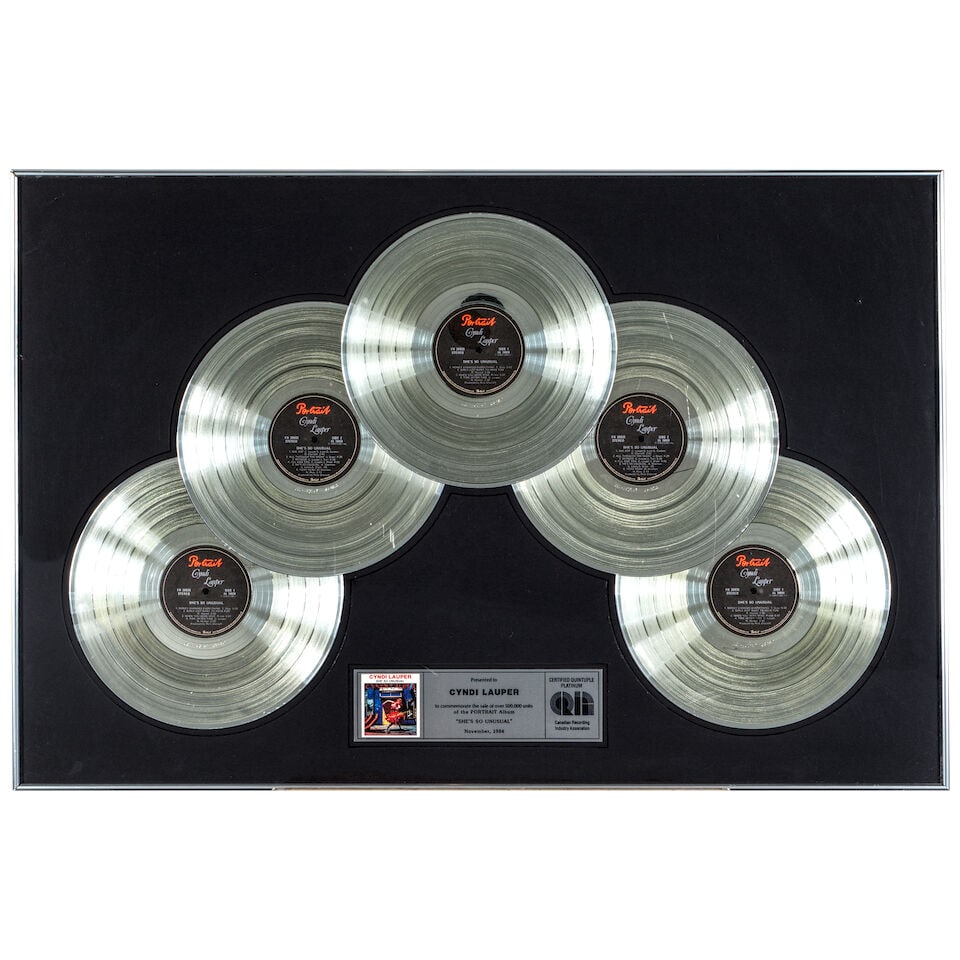 A GROUP OF FRAMED CANADIAN RECORDING INDUSTRY ASSOCIATION AWARDS PRESENTED TO CYNDI LAUPER 1984 - 7