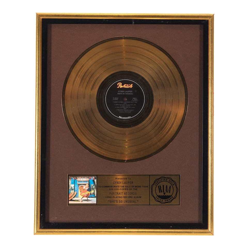 FIVE GOLD AND PLATINUM IN-HOUSE AND RIAA AWARDS FOR SHE'S SO UNUSUAL PRESENTED TO CYNDI LAUPER - 2