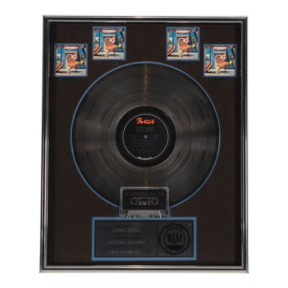 FIVE GOLD AND PLATINUM IN-HOUSE AND RIAA AWARDS FOR SHE'S SO UNUSUAL PRESENTED TO CYNDI LAUPER - 5