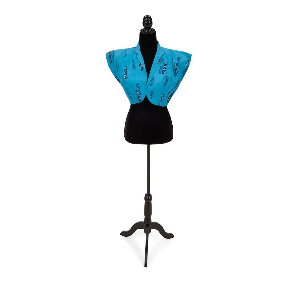 A GROUP OF STAGE-WORN CLOTHING 1984-1987: A GROUP OF STAGE-WORN CLOTHING 1984-1987 Comprising a lace trimmed brown and black tiered gingham skirt, an embellished blue shirt, a pearl embellished gray pleated skirt, a black strapless dress, a r