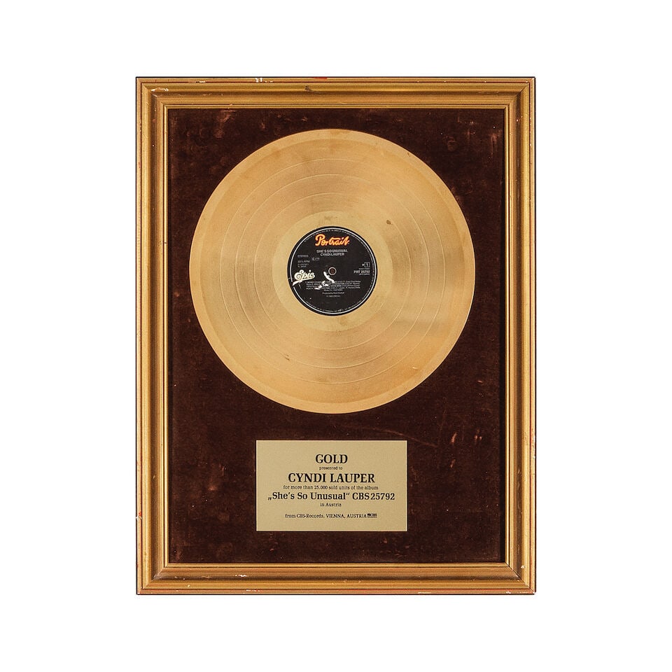 THREE FOREIGN GOLD AND PLATINUM AWARDS PRESENTED TO CYNDI LAUPER Late 1980s (1 of 3)