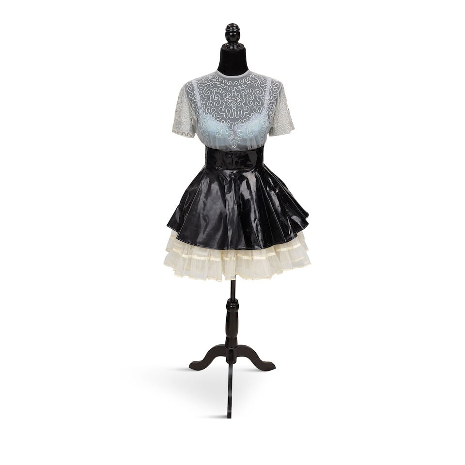 TWO PASTEL LOOKS 1980s, styled by Cyndi Lauper: TWO PASTEL LOOKS 1980s, styled by Cyndi Lauper First look: a white lace button-up blouse, size 30, a pink and white lace bodice, bust 13in, an Estrava pink skirt with white lace decoration, a Dupont