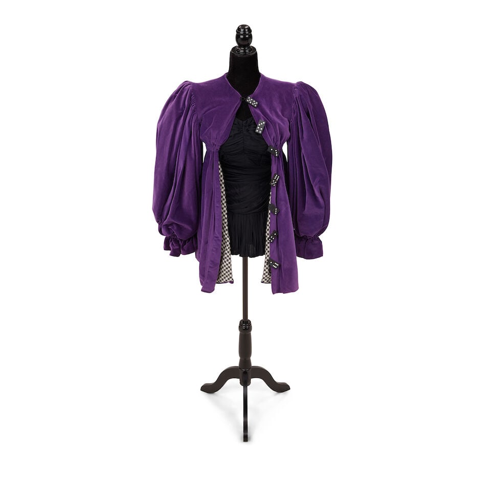 TWO VELVET LOOKS WORN DURING PUBLIC APPEARANCES Mid-1980s: TWO VELVET LOOKS WORN DURING PUBLIC APPEARANCES Mid-1980s Comprising a maroon velvet lined jacket, a Rachel London purple velvet jacket with domino buttons, and a d'Esterelle black bathing suit.