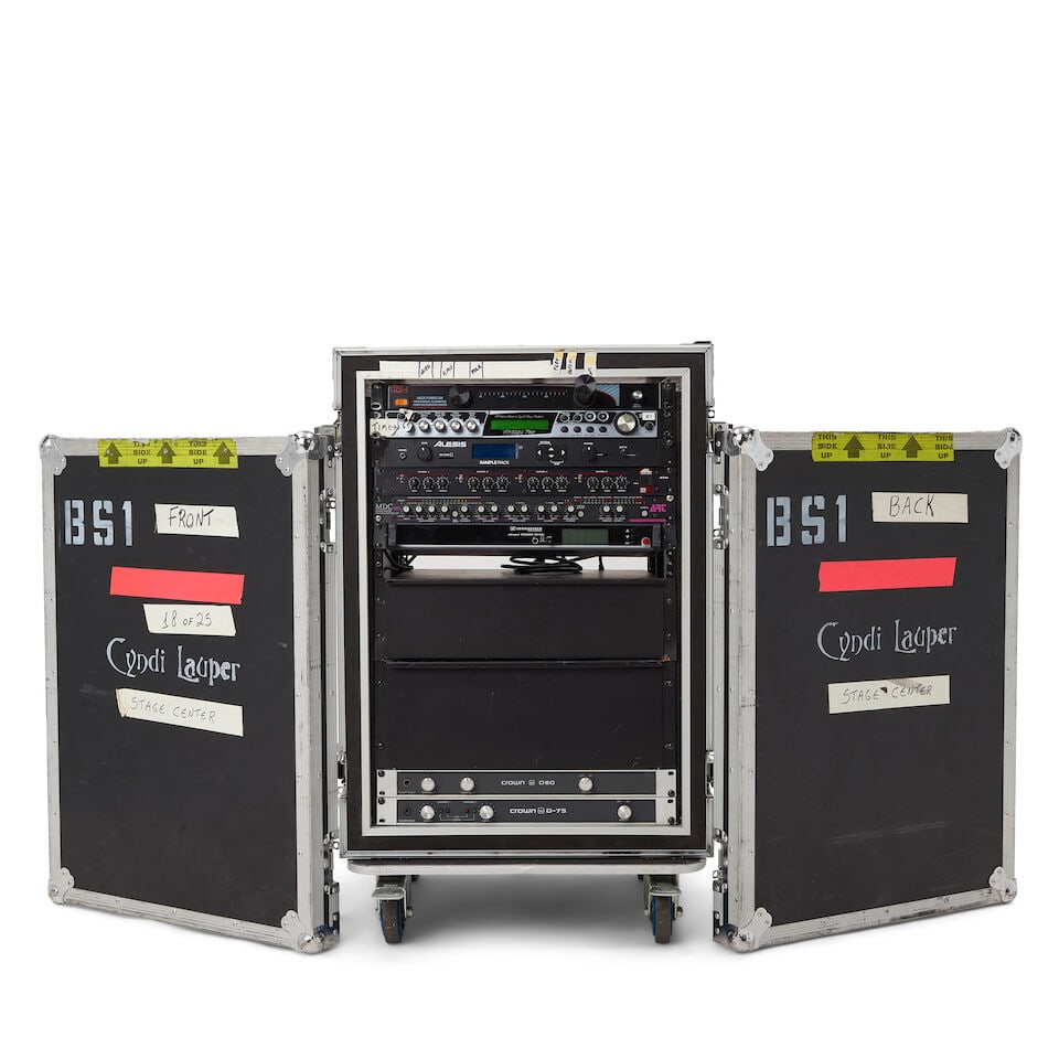 A TOUR-USED, RACK-MOUNTED AUDIO SYSTEM IN A CYNDI LAUPER STENCILED ROAD CASE: A TOUR-USED, RACK-MOUNTED AUDIO SYSTEM IN A CYNDI LAUPER STENCILED ROAD CASE Including (i) a Juice Goose Rack Power 200 Professional Illuminated Power Distribution Center; (ii) an E-mu Vintage Pro