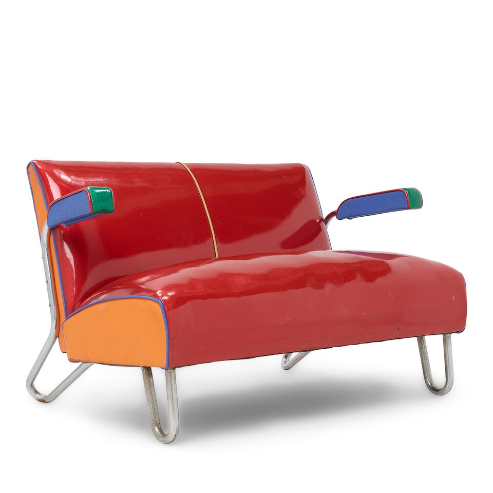 CYNDI LAUPER'S PERSONAL RED, ORANGE, AND BLUE VINYL AND FABRIC LOVESEAT 1980s: CYNDI LAUPER'S PERSONAL RED, ORANGE, AND BLUE VINYL AND FABRIC LOVESEAT 1980s 28 x 23 x 24in This lot is subject to the following lot symbols: ¤ ¤ Unless indicated by the ¤ symbol next