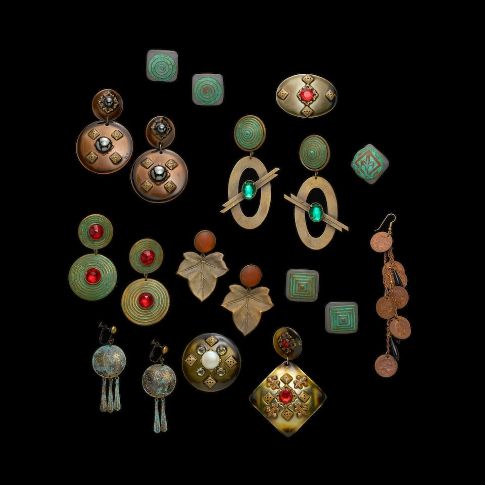 A GROUP OF STAGE-WORN VINTAGE ENAMEL AND METALLIC COSTUME JEWELRY 1980s: A GROUP OF STAGE-WORN VINTAGE ENAMEL AND METALLIC COSTUME JEWELRY 1980s Including a pair of leaf earrings, a beaded necklace, and a frame pin. This lot is subject to the following lot symbols: ¤ 