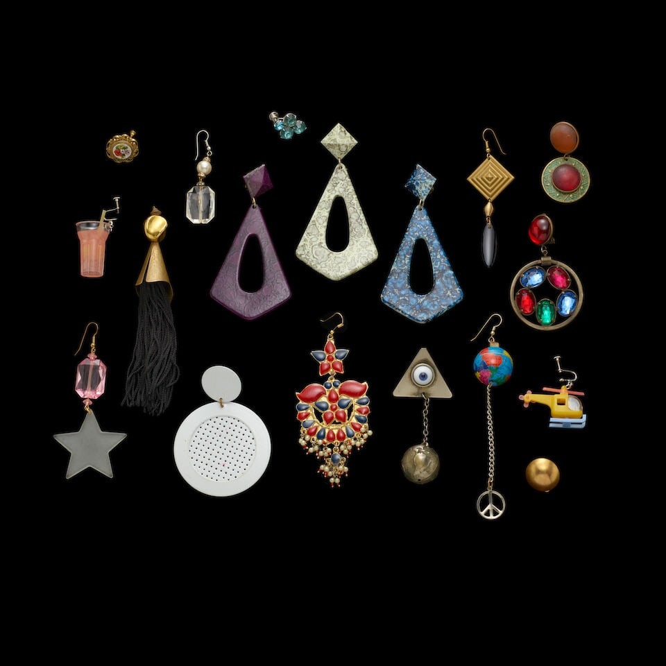 A GROUP OF STAGE-WORN SINGLE EARRINGS 1980s - 2