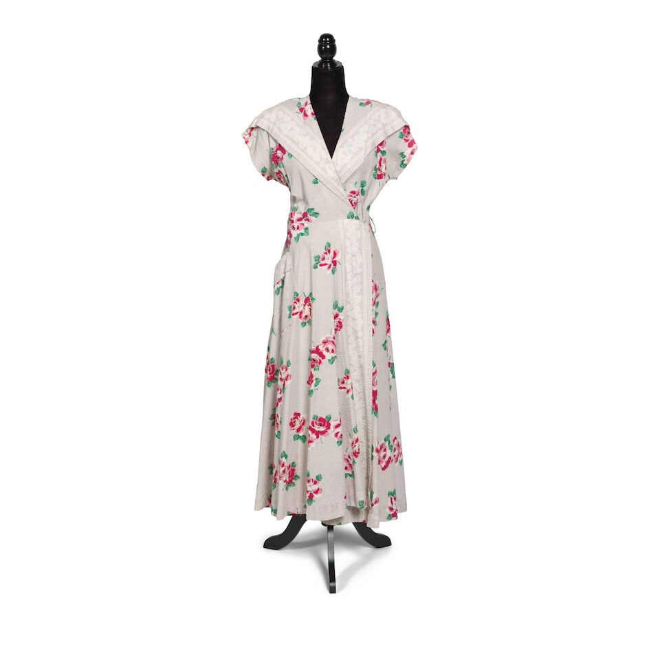 A GROUP OF CLOTHING FROM A HAT FULL OF STARS 1993: A GROUP OF CLOTHING FROM A HAT FULL OF STARS 1993 Comprising a black stitched white shirt, a sailor jacket, a floral print dress, an embellished black lace overlay dress, a pistachio velvet dress with