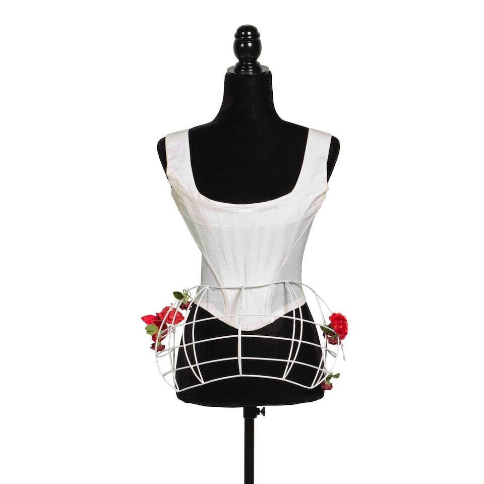 A VIVIENNE WESTWOOD WHITE BUSTIER AND WHITE WIRE CAGE BUSTLE WITH FAUX ROSES 'Vive La Cocotte' C...: A VIVIENNE WESTWOOD WHITE BUSTIER AND WHITE WIRE CAGE BUSTLE WITH FAUX ROSES 'Vive La Cocotte' Collection, Fall/Winter 1995-96 and 'Les Femmes Ne Pas Toute Leur Coquetterie' Collection, Spring/Summer