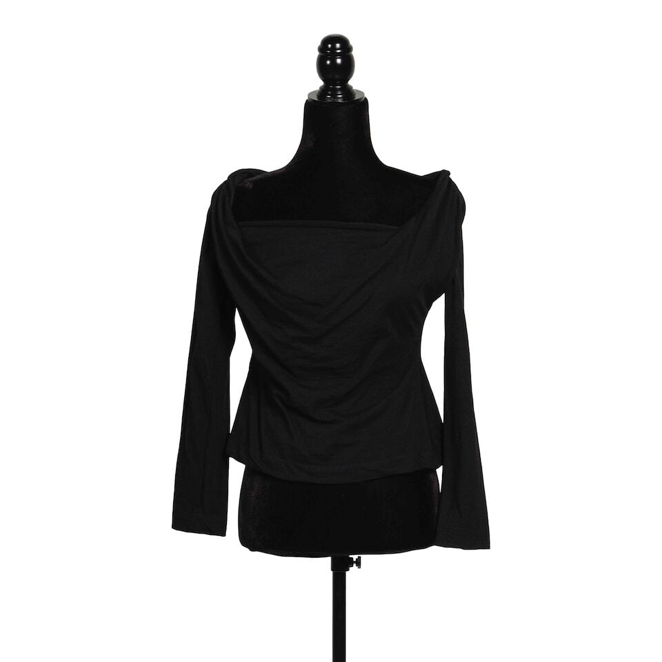A VIVIENNE WESTWOOD BLACK LONG SLEEVE TOP AND MINI SKIRT Vivienne Westwood, 1990s: A VIVIENNE WESTWOOD BLACK LONG SLEEVE TOP AND MINI SKIRT Vivienne Westwood, 1990s Comprising a black wool long sleeve top, 1994-1997, UK 14, and a black wool blend mini skirt with pink lined interior,