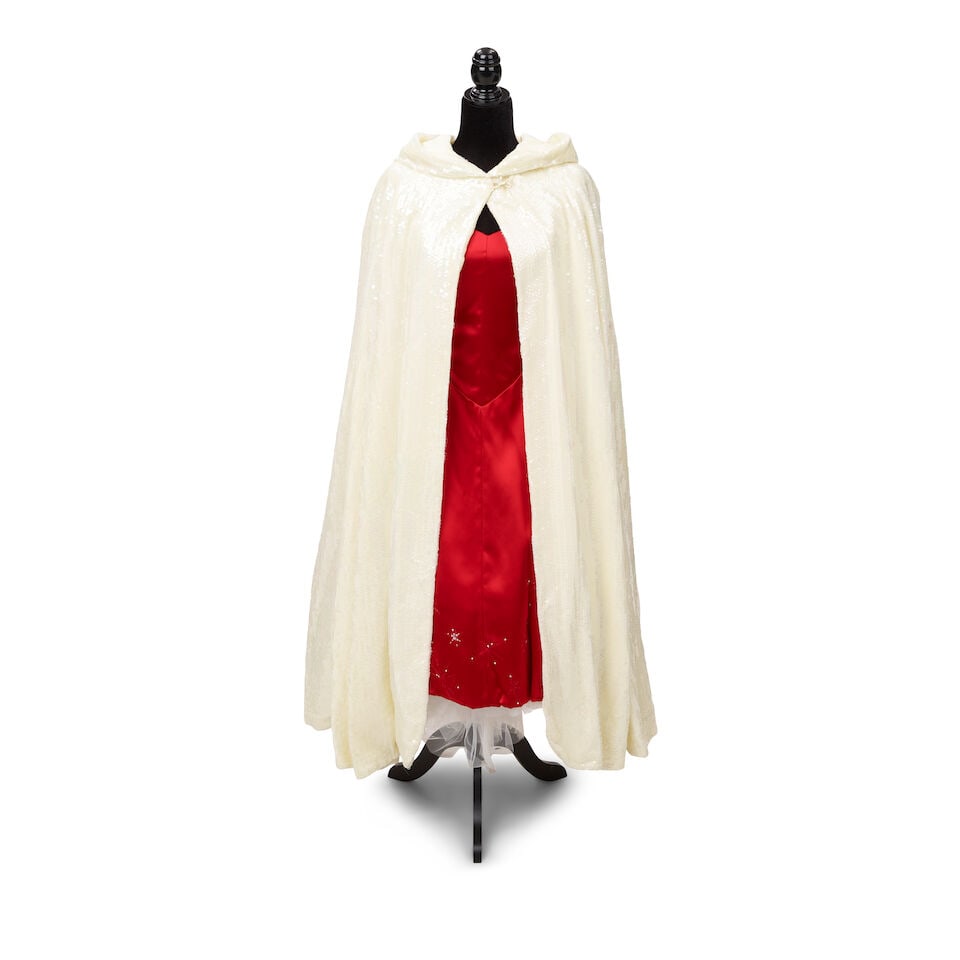 A WHITE SEQUINED HOODED CAPE AND RED SATIN DRESS FROM AN NBC CHRISTMAS SPECIAL 1998: A WHITE SEQUINED HOODED CAPE AND RED SATIN DRESS FROM AN NBC CHRISTMAS SPECIAL 1998 Comprising a white sequined hooded cape and a rhinestone embellished red satin and white tulle dress worn onstage