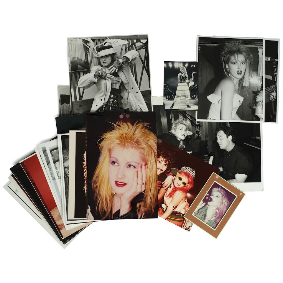 A GROUP OF PHOTOGRAPHS OF CYNDI LAUPER 1980s: A GROUP OF PHOTOGRAPHS OF CYNDI LAUPER 1980s Two stamped by Kim Ramsey (on the verso), one also signed and dated (on the image), one stamped Mark Sgro (on the verso), two stamped by Anastasia
